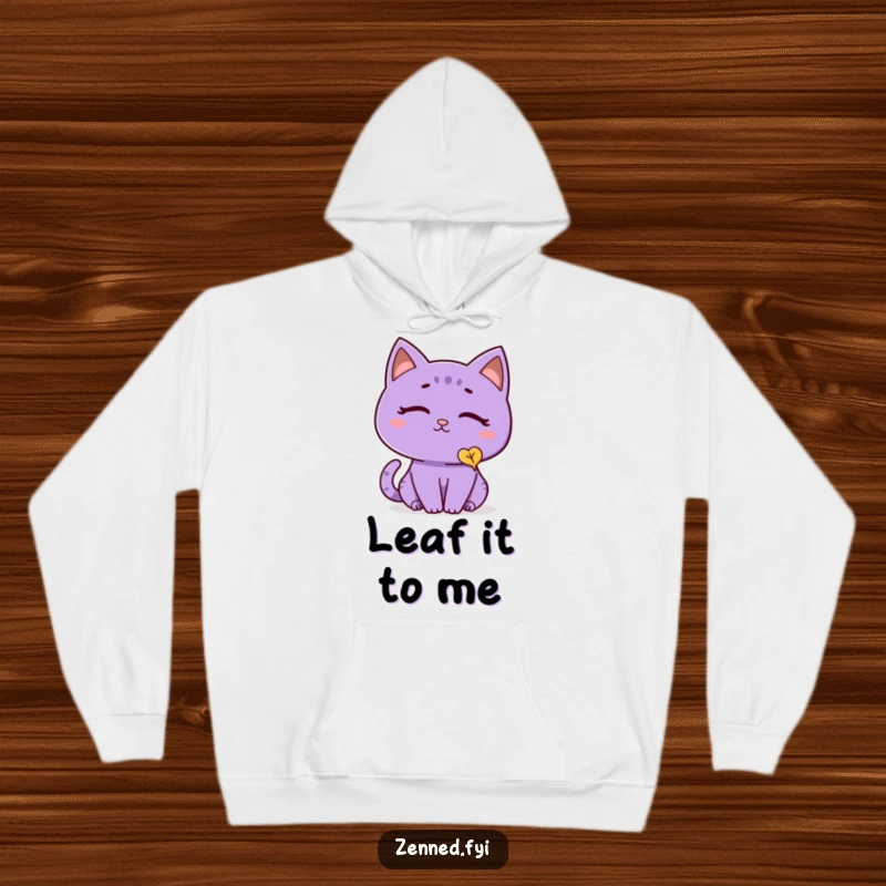 Funny cat hoodie showcasing a thoughtful purple cat with a peaceful expression, watching a gently falling leaf, providing warmth and humor.