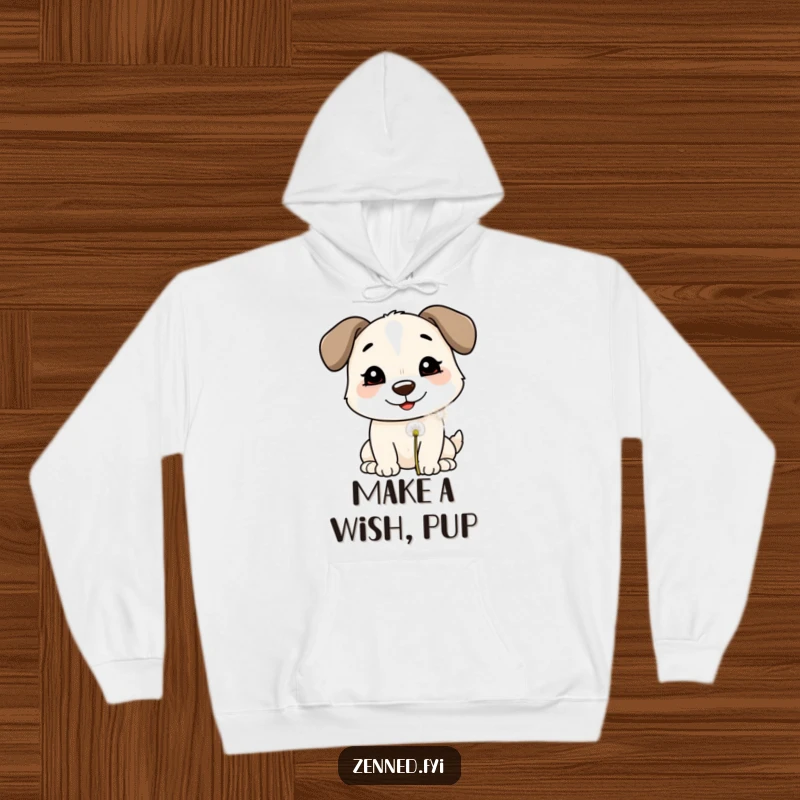 Funny Hoodie: A smiling dog blowing on a dandelion puff, offering cozy comfort and a serene dose of canine wishfulness.
