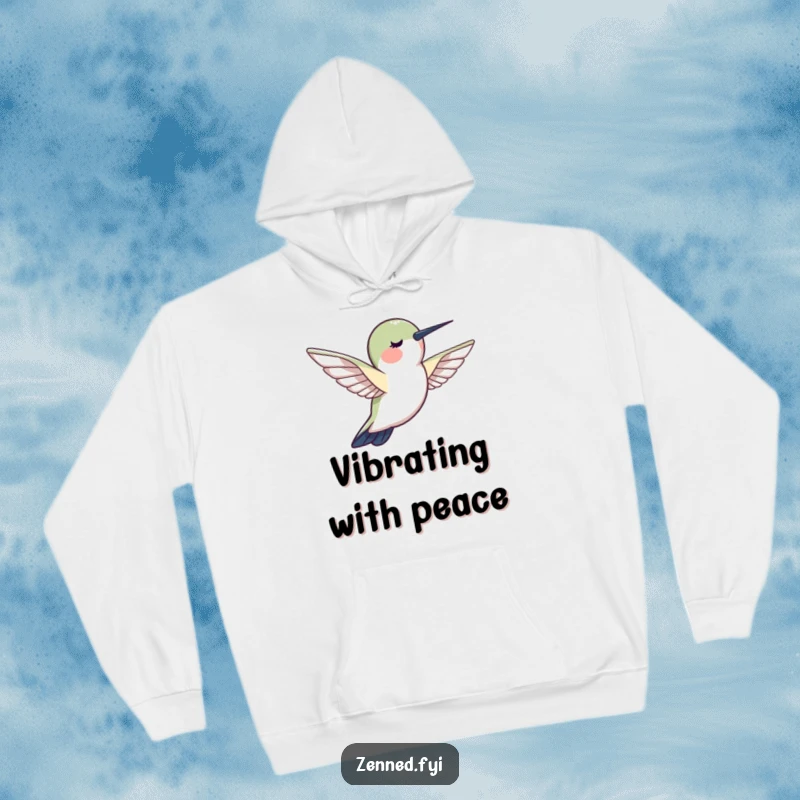 Funny hummingbird hoodie, a creature hovering motionlessly, radiating peace and calmness, offering cozy zen.